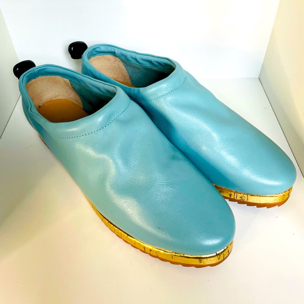 Yevrah brand. Beautiful blue leather, cork sole. Never worn.